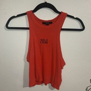 An orange tank top shirt